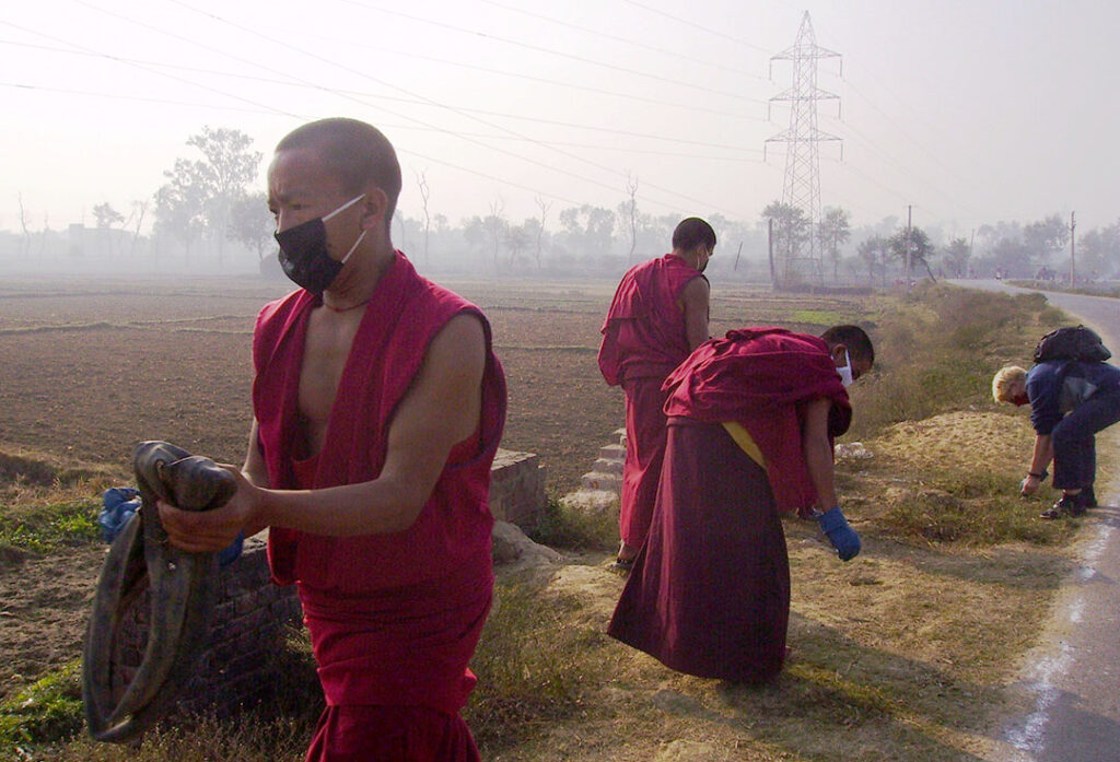 Cleaning the road to Tergar Monastery with H.H.Karmapa monks